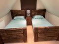 Lit simple en bois massif